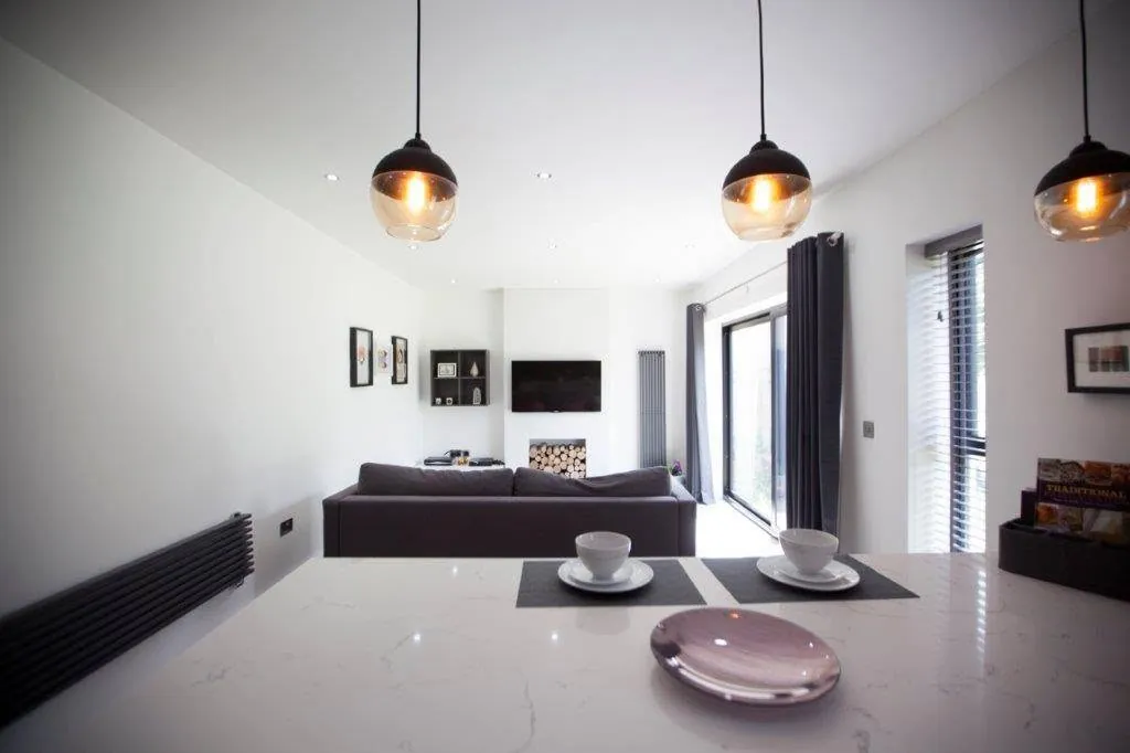 Open-plan kitchen with breakfast bar